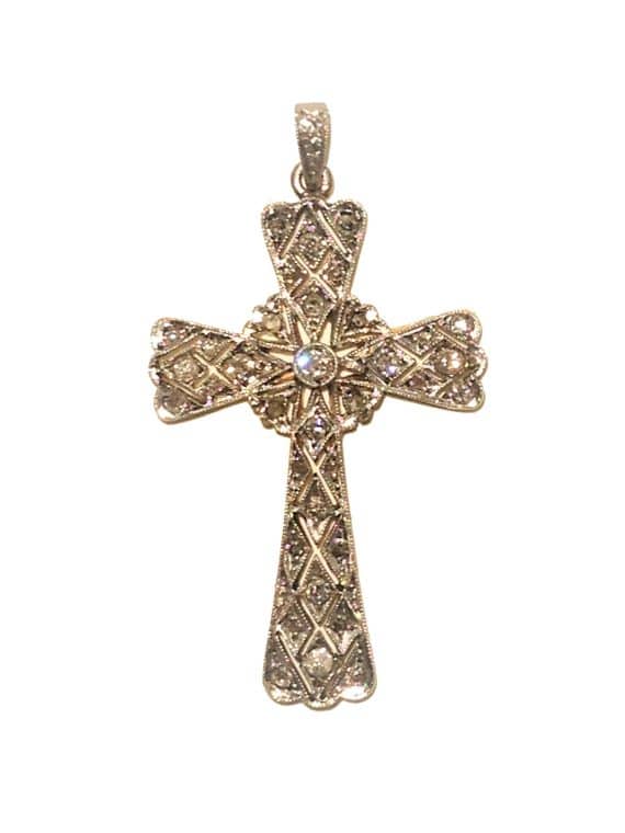 A diamond cross pendant