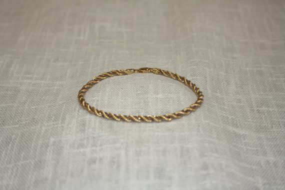 Bracciale a corda in due colori d' oro