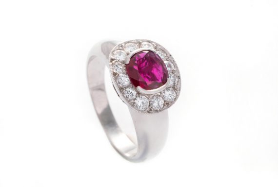 A platinum ruby and diamond ring